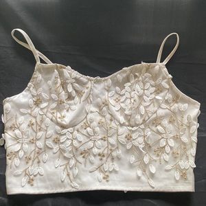 SHEIN white cami top with bronze and white flower detail